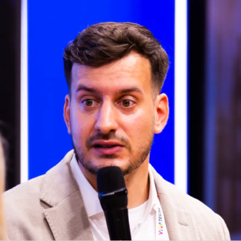 Valentino Koester speaking into a microphone